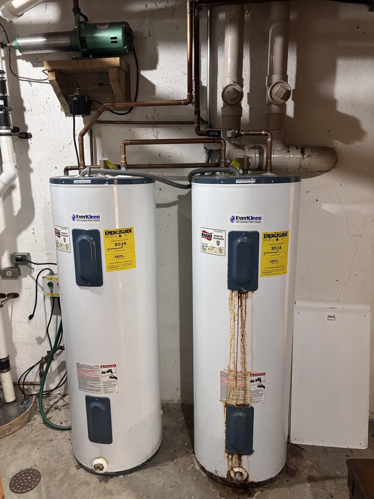 Two new electric water heaters side by side