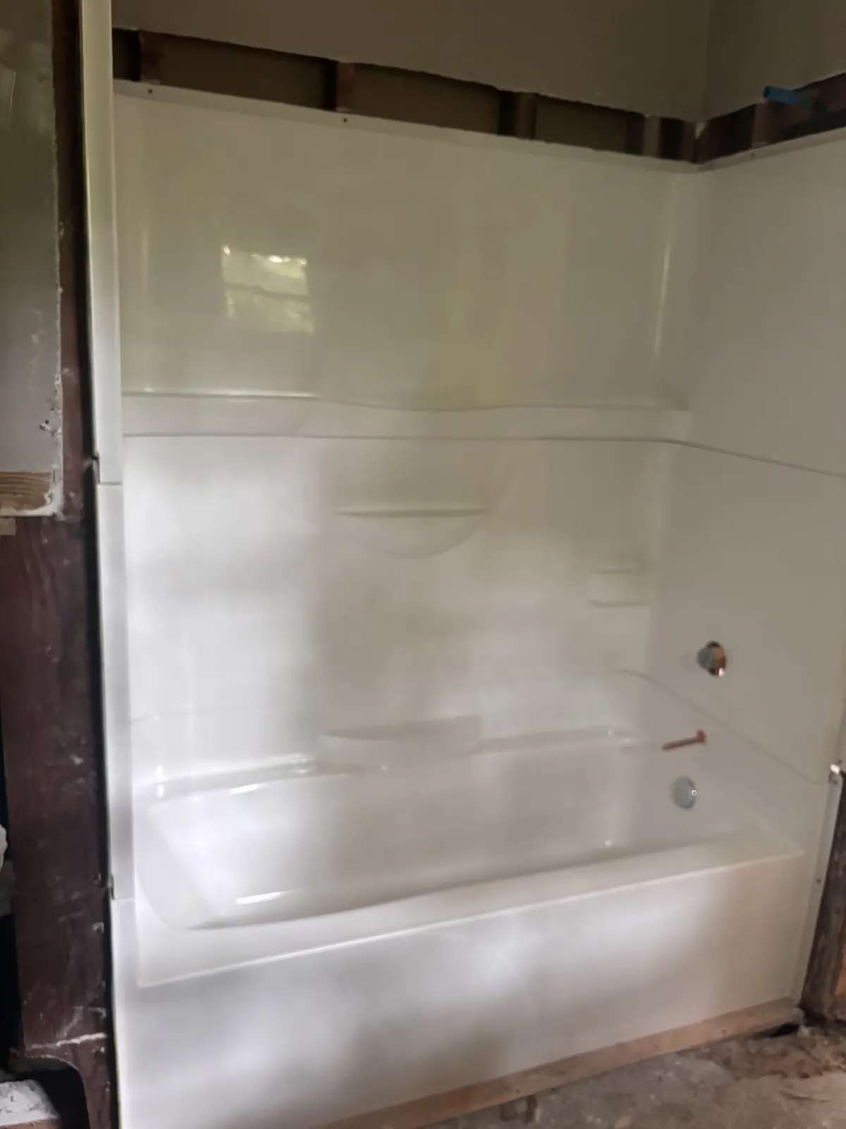 New tub and shower surround in a bathroom remodel