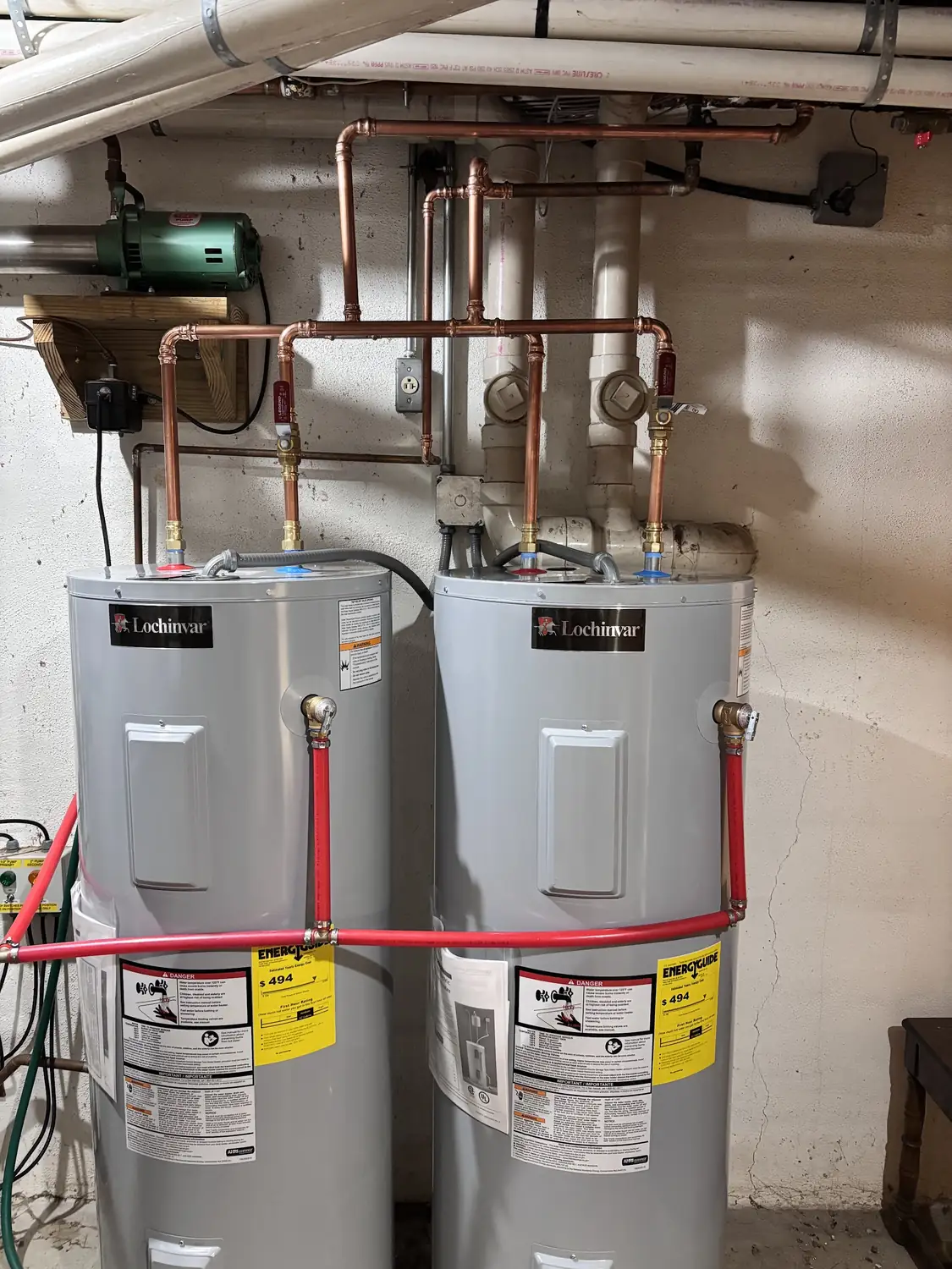 Two new electric water heaters with new copper water lines